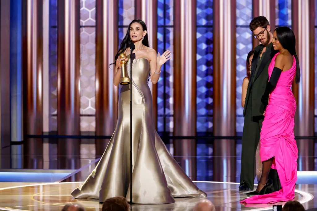 Demi Moore accepting the Golden Globe for The Substance