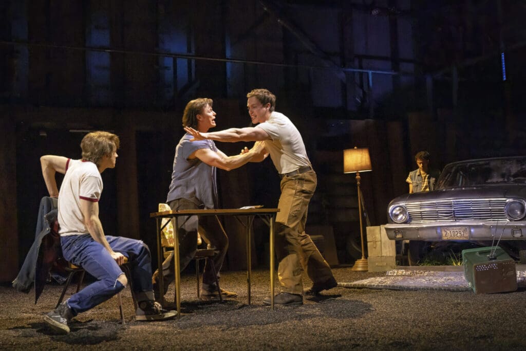 Photo of Jason Schmidt in a performance of The Outsiders
