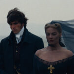 (L-R) JACOB ELORDI as Heathcliff and Actor, Producer MARGOT ROBBIE as Catherine Earnshaw in “Wuthering Heights,” a Warner Bros. Pictures Release.