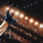 photo of Harry Styles performing in Manchester