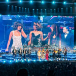 RAYE performing at MGM Music Hall Fenway in Boston with her siters Amma and Absolutely