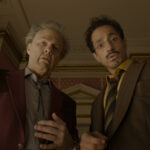 (L-r) TOM CRUISE as Rockwell and RIZ AHMED as Ganesh in Warner Bros. Pictures and Legendary Pictures’ “DIGGER,” a Warner Bros. Pictures release.